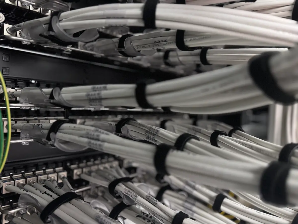 Labelled Cat6A bundles dressed into the rack.